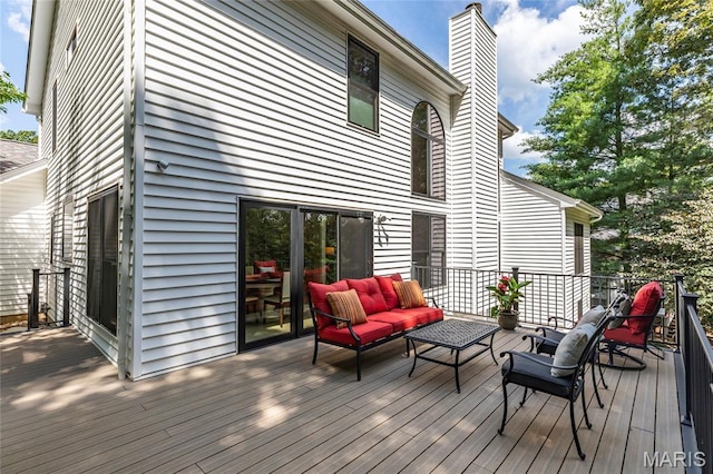 2260 Crimson View Dr, Wildwood, MO 63011 - wooden deck featuring an outdoor hangout area