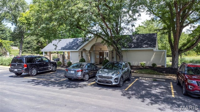 2260 Crimson View Dr, Wildwood, MO 63011 - view of front of home featuring uncovered parking and a shingled roof