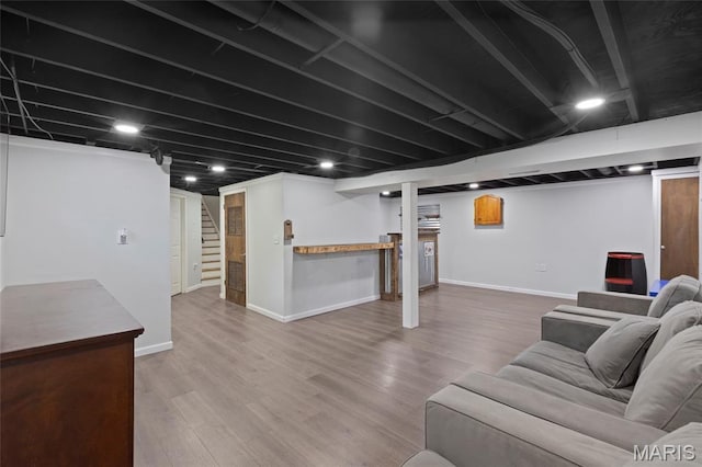 1117 Nelda Dr, Imperial, MO 63052 - living room with stairway and wood finished floors