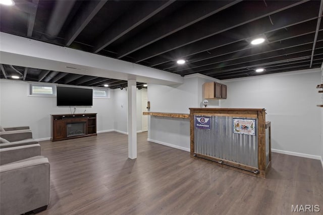 1117 Nelda Dr, Imperial, MO 63052 - below grade area with dark wood-type flooring and bar