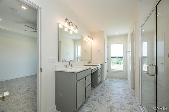 8971 Eager Rd, Richmond Heights, MO 63144 - full bathroom featuring double vanity, a stall shower, and recessed lighting