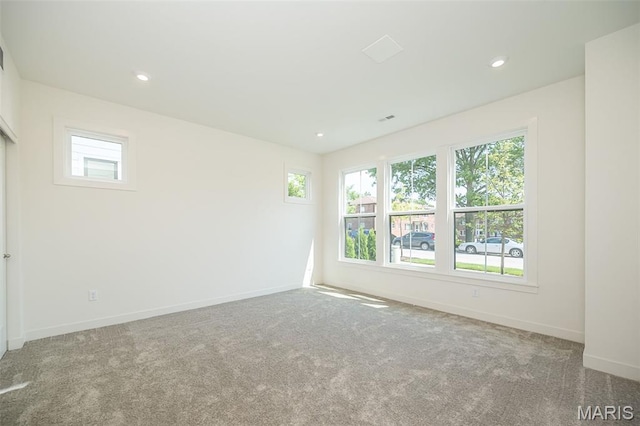 8971 Eager Rd, Richmond Heights, MO 63144 - unfurnished room featuring plenty of natural light, carpet, and recessed lighting