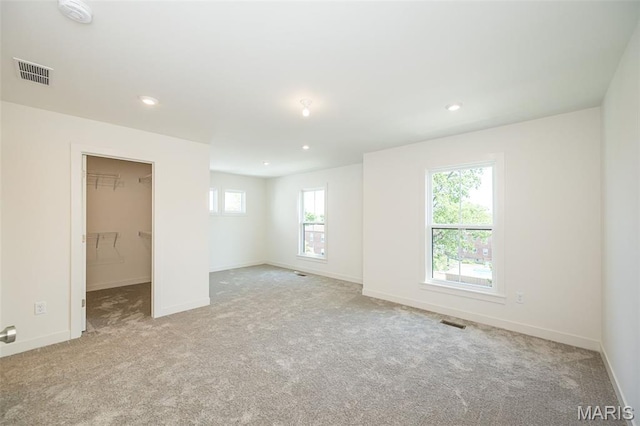 8971 Eager Rd, Richmond Heights, MO 63144 - carpeted empty room featuring a smoke detector and recessed lighting