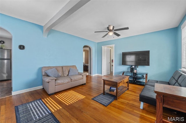 2648 E 27th St, Granite City, IL 62040 - living room featuring arched walkways, a ceiling fan, and hardwood / wood-style floors