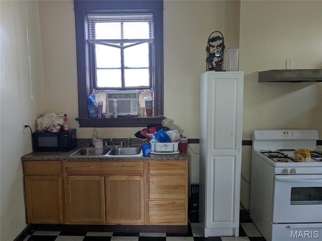 3744 Michigan Ave, Saint Louis, MO 63118 - kitchen with white gas range, black microwave, tile patterned floors, and cooling unit