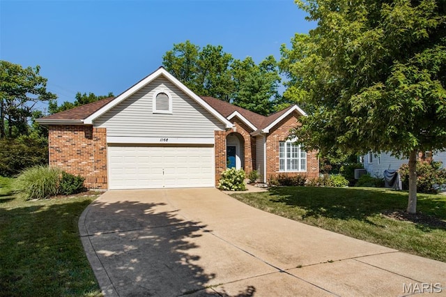 1168 Oak Knoll Manor Ct, Saint Louis, MO 63119 - ranch-style home featuring brick siding, driveway, a front yard, and a garage