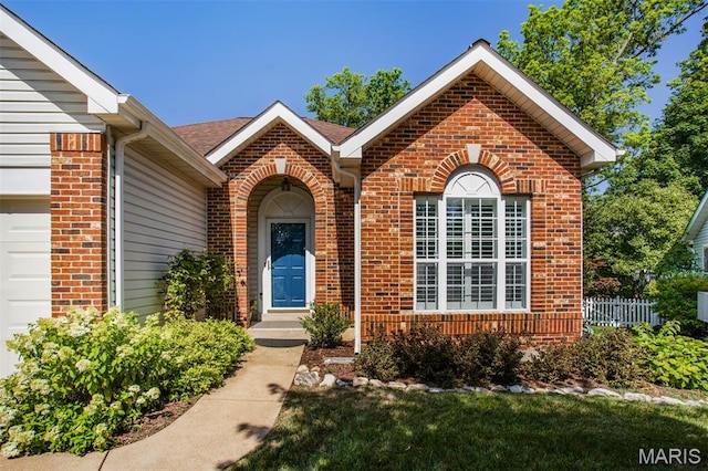 1168 Oak Knoll Manor Ct, Saint Louis, MO 63119 - property entrance with brick siding and a garage