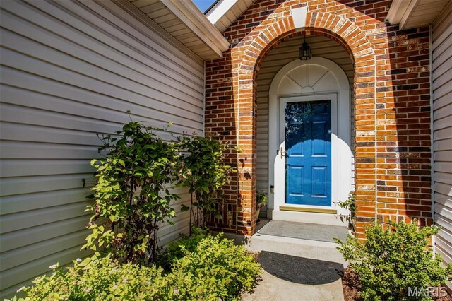 1168 Oak Knoll Manor Ct, Saint Louis, MO 63119 - view of exterior entry featuring brick siding