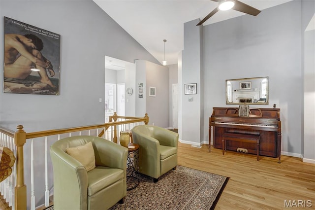 1168 Oak Knoll Manor Ct, Saint Louis, MO 63119 - living area with ceiling fan, wood finished floors, and high vaulted ceiling