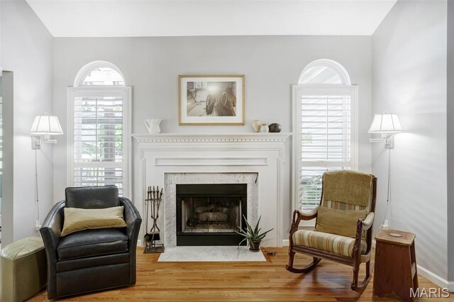 1168 Oak Knoll Manor Ct, Saint Louis, MO 63119 - sitting room featuring wood finished floors and a fireplace