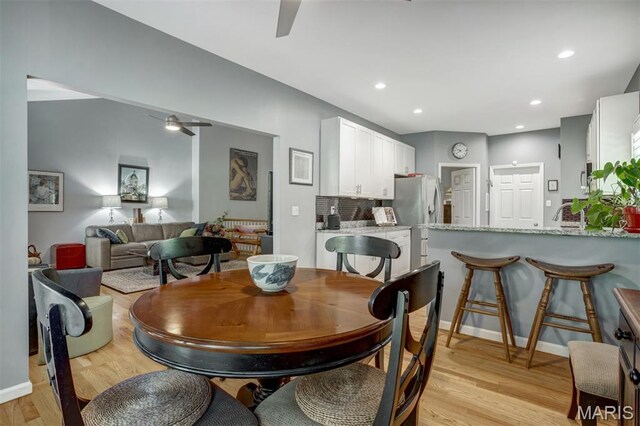1168 Oak Knoll Manor Ct, Saint Louis, MO 63119 - dining space featuring ceiling fan, light wood finished floors, and recessed lighting