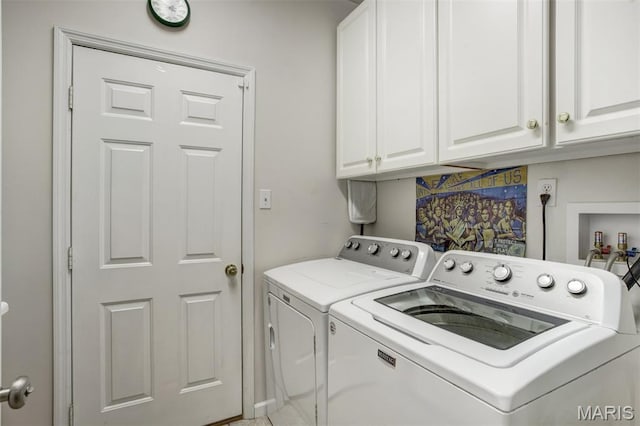 1168 Oak Knoll Manor Ct, Saint Louis, MO 63119 - laundry area featuring washer and clothes dryer and cabinet space