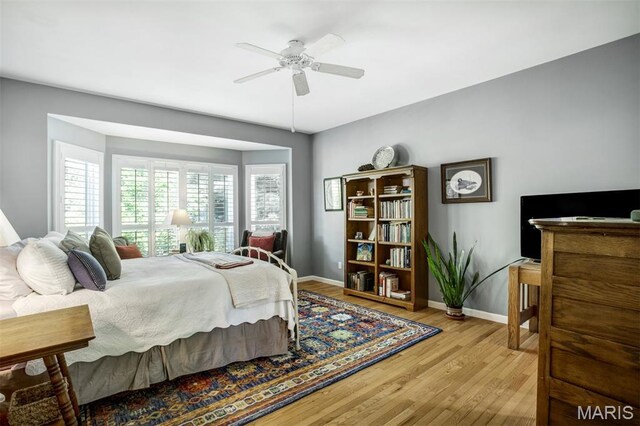 1168 Oak Knoll Manor Ct, Saint Louis, MO 63119 - bedroom featuring wood finished floors and ceiling fan
