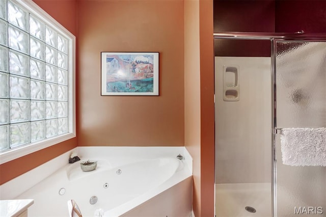 1168 Oak Knoll Manor Ct, Saint Louis, MO 63119 - bathroom featuring a stall shower and a tub with jets