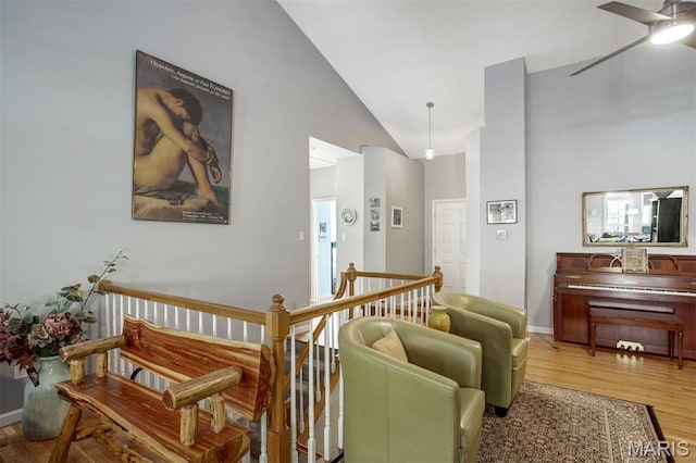 1168 Oak Knoll Manor Ct, Saint Louis, MO 63119 - living room with a ceiling fan, high vaulted ceiling, and wood finished floors