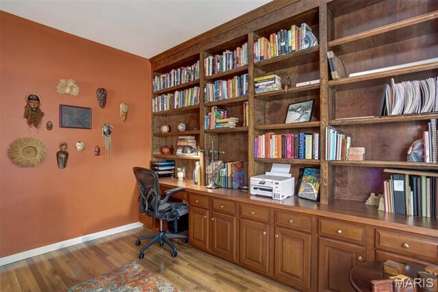 1168 Oak Knoll Manor Ct, Saint Louis, MO 63119 - office area featuring built in study area and light wood finished floors