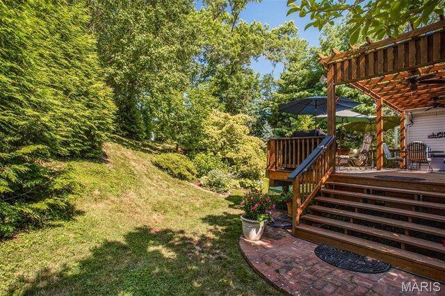 1168 Oak Knoll Manor Ct, Saint Louis, MO 63119 - view of grassy yard featuring a wooden deck, stairway, and a pergola