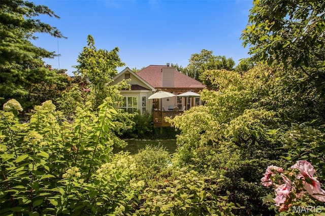 1168 Oak Knoll Manor Ct, Saint Louis, MO 63119 - rear view of house featuring a chimney and a wooden deck