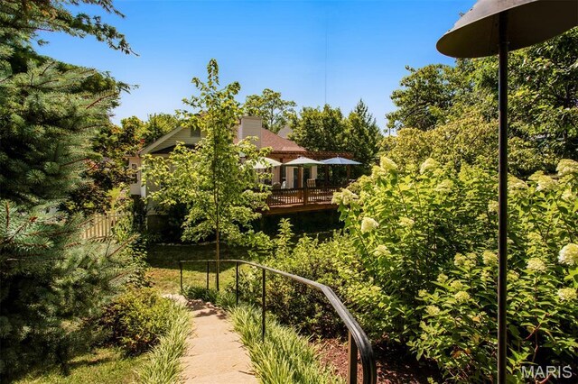 1168 Oak Knoll Manor Ct, Saint Louis, MO 63119 - view of yard featuring a deck
