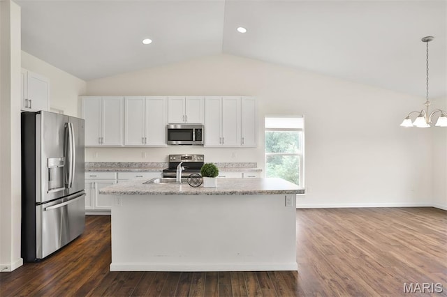 2904 Sierra View Ct, Imperial, MO 63052 - kitchen with stainless steel appliances, lofted ceiling, white cabinetry, a chandelier, and pendant lighting