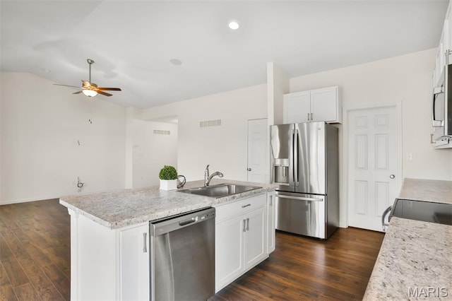 2904 Sierra View Ct, Imperial, MO 63052 - kitchen featuring appliances with stainless steel finishes, ceiling fan, a kitchen island with sink, dark wood-type flooring, and lofted ceiling