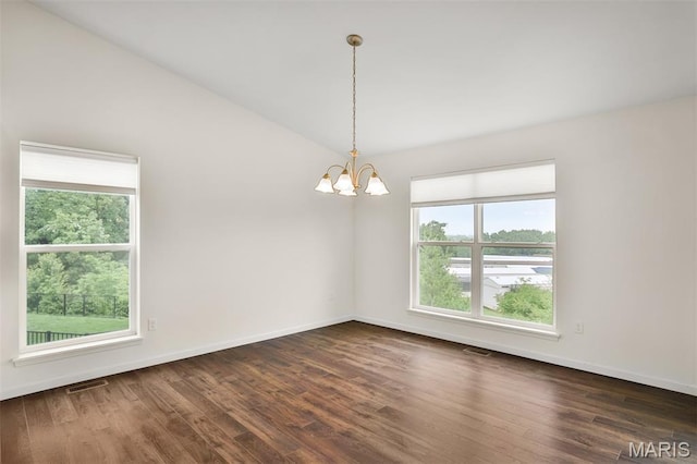 2904 Sierra View Ct, Imperial, MO 63052 - unfurnished room featuring healthy amount of natural light, dark wood-style floors, and a chandelier