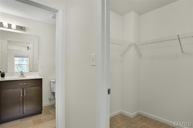2904 Sierra View Ct, Imperial, MO 63052 - walk in closet with a sink