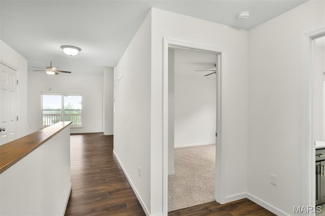 2904 Sierra View Ct, Imperial, MO 63052 - hallway with dark wood-style flooring and baseboards