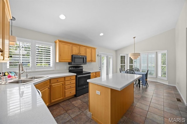 1211 Conrad Ln, Ofallon, IL 62269 - kitchen featuring electric stove, light countertops, a center island, vaulted ceiling, and pendant lighting
