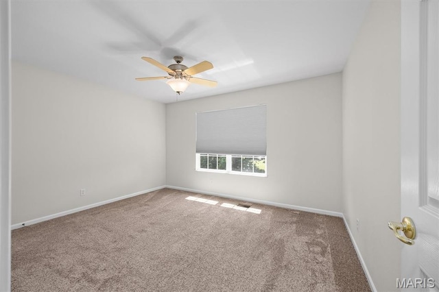 1211 Conrad Ln, Ofallon, IL 62269 - carpeted empty room featuring baseboards and ceiling fan