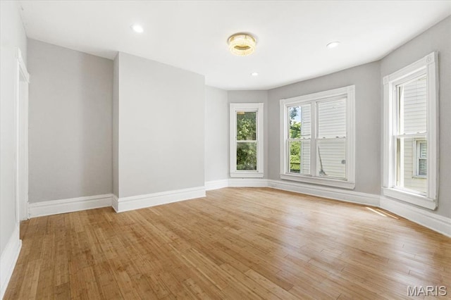 5829 Bartmer Ave, Saint Louis, MO 63112 - spare room featuring light wood-style flooring and recessed lighting