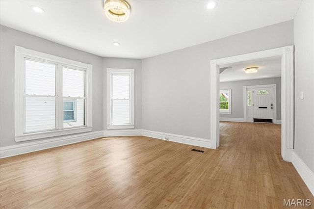 5829 Bartmer Ave, Saint Louis, MO 63112 - spare room featuring light wood-style flooring and recessed lighting