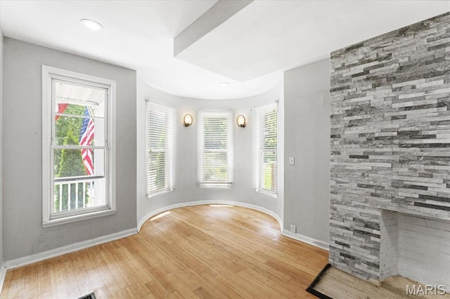 5829 Bartmer Ave, Saint Louis, MO 63112 - spare room featuring wood finished floors, plenty of natural light, and recessed lighting