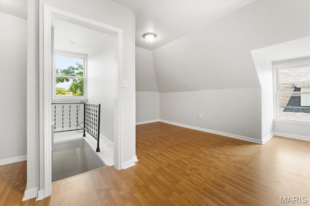 5829 Bartmer Ave, Saint Louis, MO 63112 - bonus room featuring wood finished floors and lofted ceiling