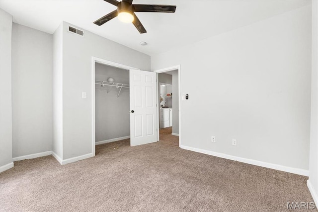 5829 Bartmer Ave, Saint Louis, MO 63112 - unfurnished bedroom featuring carpet flooring, a closet, and ceiling fan