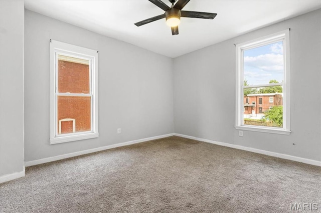 5829 Bartmer Ave, Saint Louis, MO 63112 - spare room with a ceiling fan and carpet flooring
