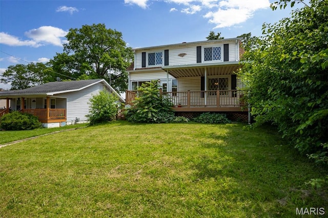 3513 Coronado Dr, Alton, IL 62002 - view of front of house with a front lawn and a wooden deck