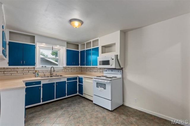 3513 Coronado Dr, Alton, IL 62002 - kitchen with white appliances, blue cabinetry, and decorative backsplash