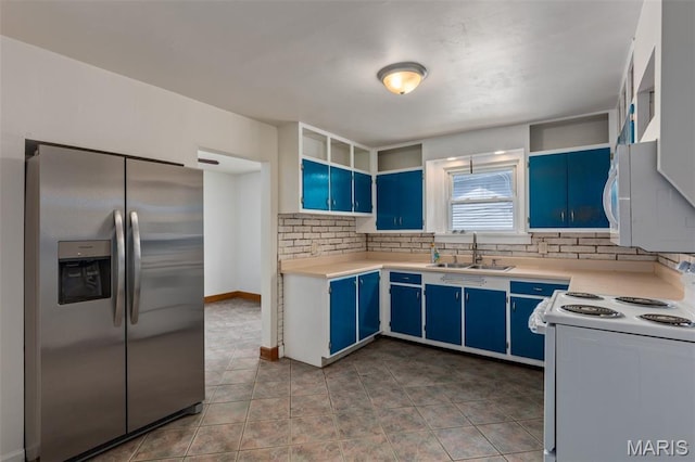 3513 Coronado Dr, Alton, IL 62002 - kitchen featuring white appliances, blue cabinetry, backsplash, and light countertops