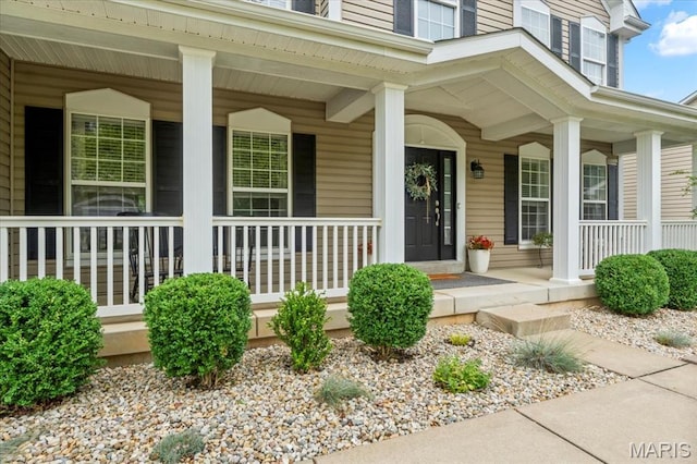 1412 Heritage Valley Dr, High Ridge, MO 63049 - doorway to property with a porch