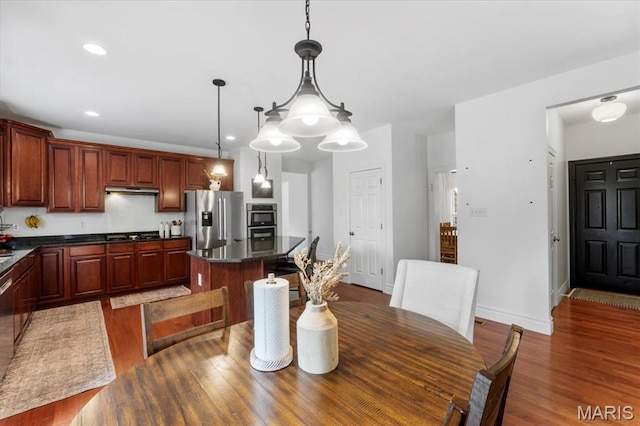 1412 Heritage Valley Dr, High Ridge, MO 63049 - dining room featuring wood finished floors and recessed lighting