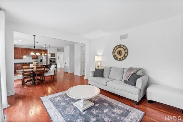 1412 Heritage Valley Dr, High Ridge, MO 63049 - living room featuring wood-type flooring and recessed lighting