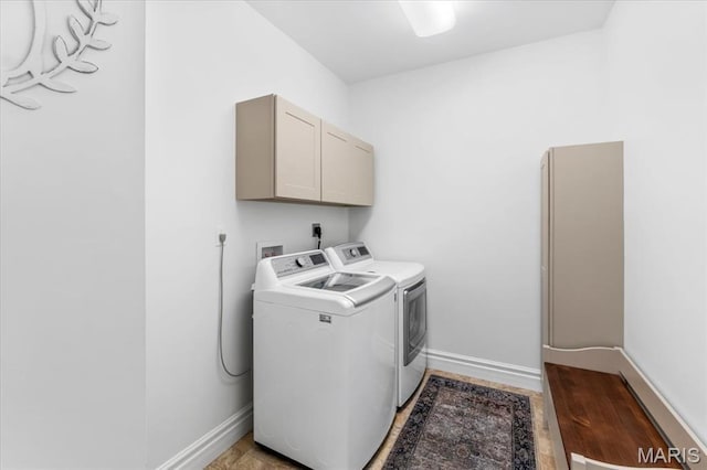 1412 Heritage Valley Dr, High Ridge, MO 63049 - laundry area with cabinet space and independent washer and dryer