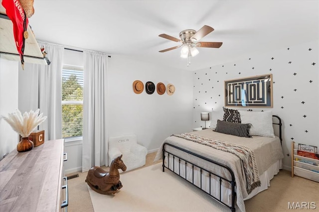 1412 Heritage Valley Dr, High Ridge, MO 63049 - carpeted bedroom with baseboards and ceiling fan