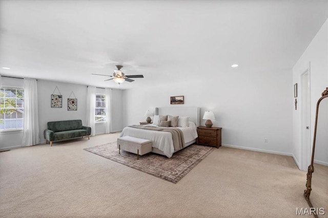 1412 Heritage Valley Dr, High Ridge, MO 63049 - bedroom with light carpet, multiple windows, a ceiling fan, and recessed lighting