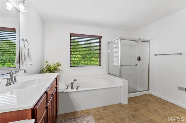 1412 Heritage Valley Dr, High Ridge, MO 63049 - full bathroom with vanity, a shower stall, and a bath
