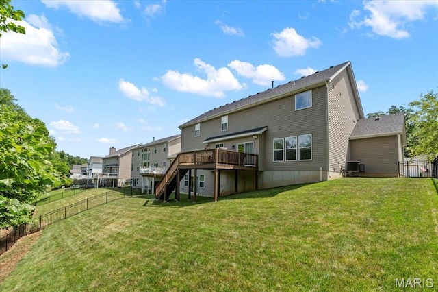 1412 Heritage Valley Dr, High Ridge, MO 63049 - back of house with stairs, a wooden deck, and a fenced backyard