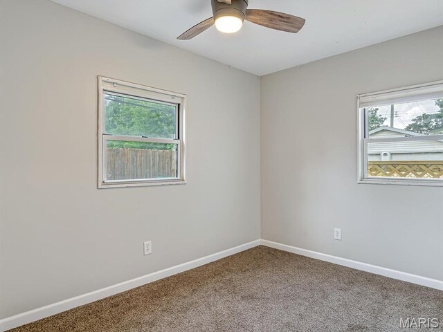 628 E Chain Of Rocks Rd, Granite City, IL 62040 - carpeted spare room featuring plenty of natural light and a ceiling fan