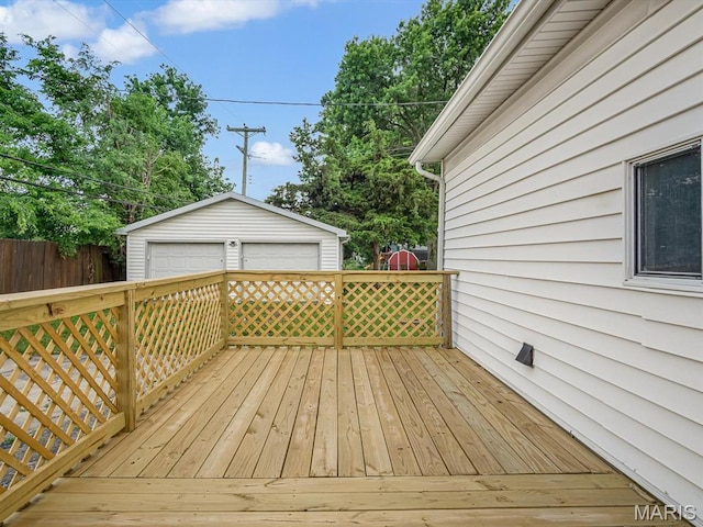 628 E Chain Of Rocks Rd, Granite City, IL 62040 - wooden terrace with a garage and an outdoor structure