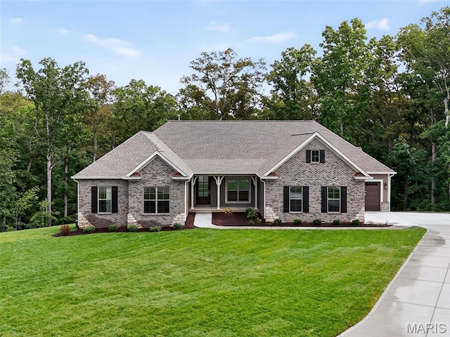 212 Terradel Trl, Foristell, MO 63348 - view of front of property with concrete driveway, a front lawn, brick siding, and roof with shingles